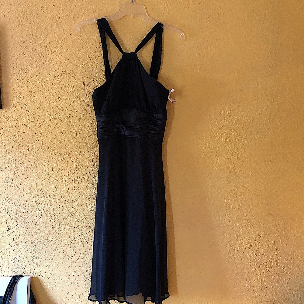 Small black dress size 8 with tags (never worn)